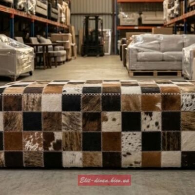 прямоугольный пуфик из кусочков коровьей кожи разного цвета